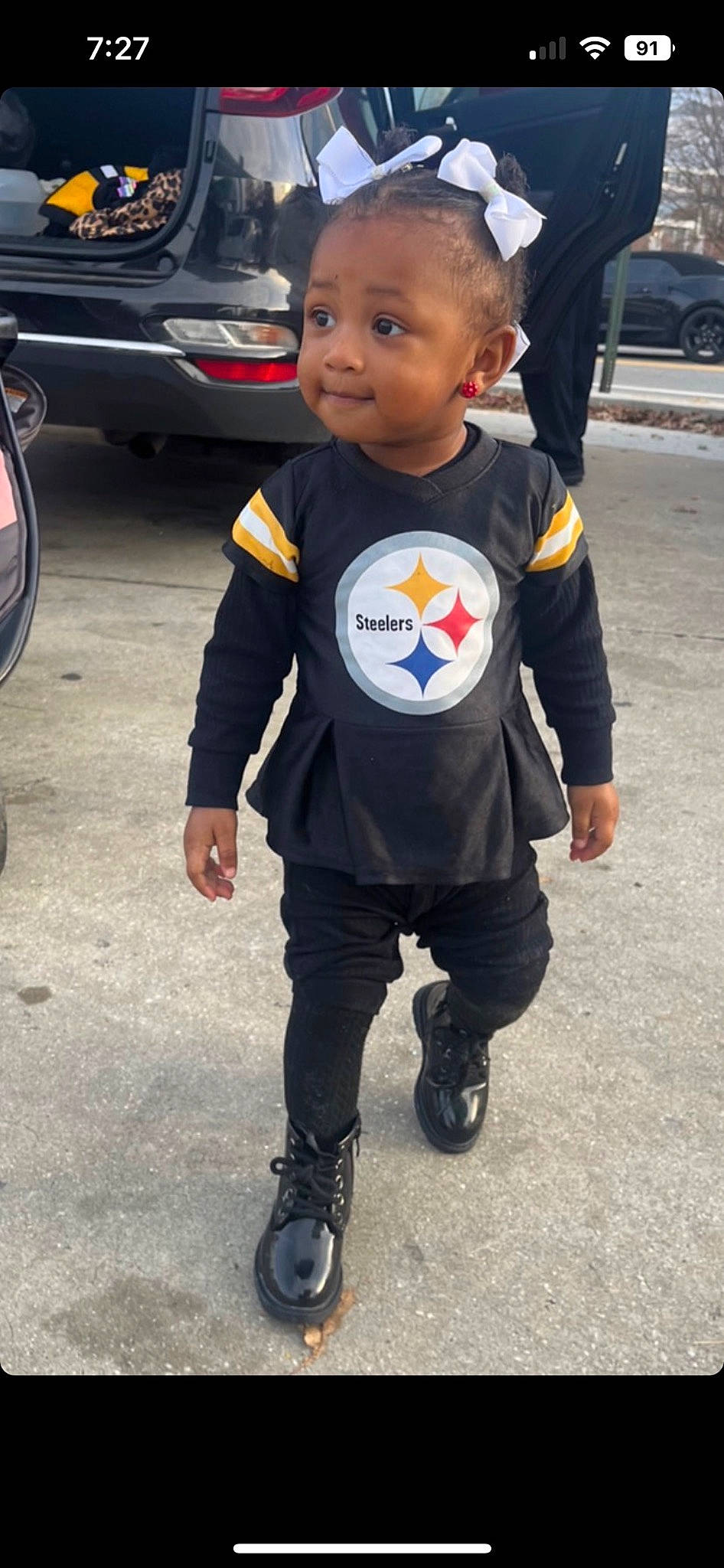 Za'Nylah joined the competition — help win amazing prizes! asphalt, automotive_exterior, automotive_lighting, automotive_tire, baby, car, child, family_car, fictional_character, fun, luxury_vehicle, parking, person, plant, sleeve, sportswear, t_shirt, tire, toddler, vehicle_door