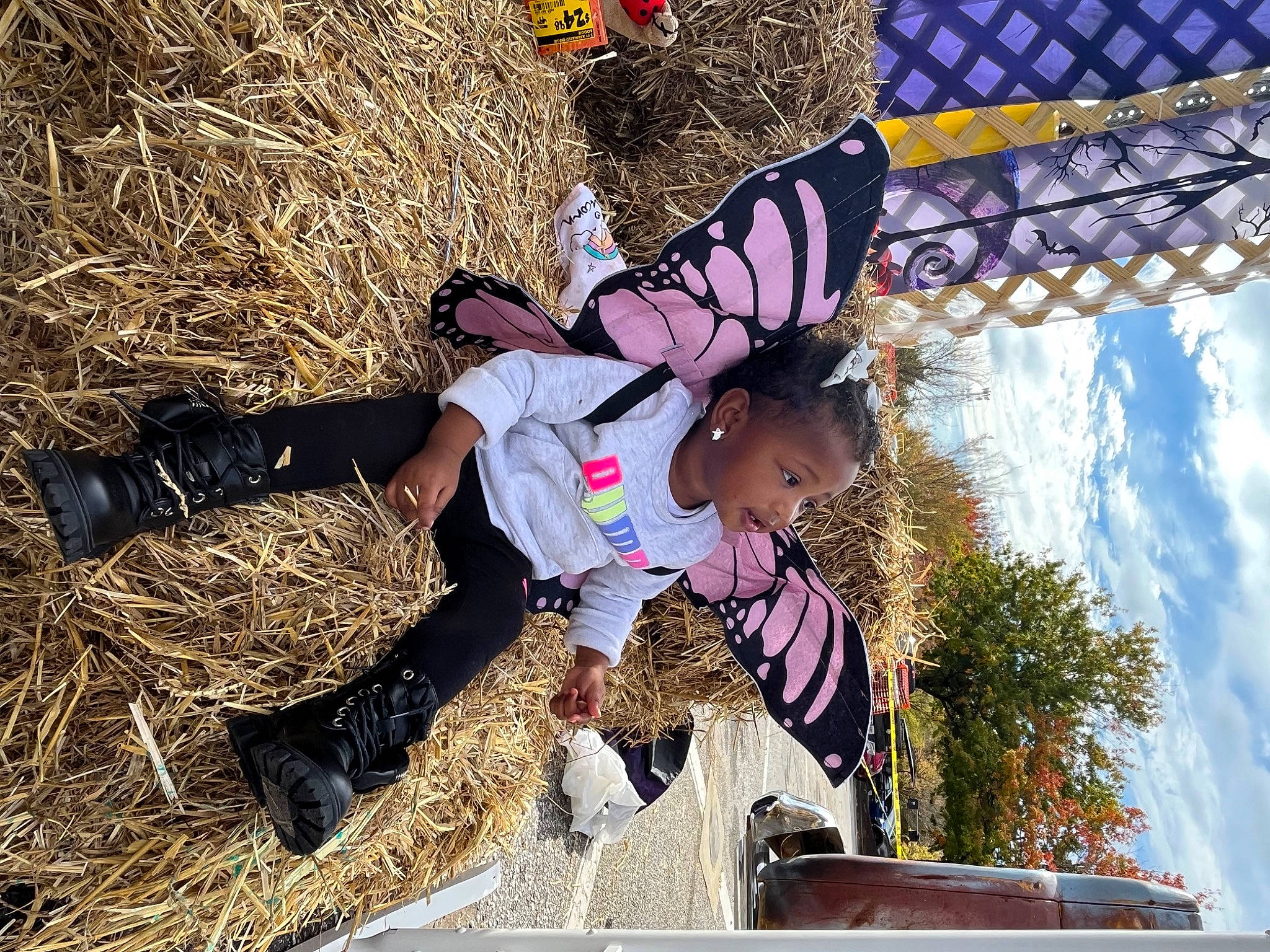 Za'Nylah is registered to the contest to win money with this photo: amusement_ride, boot, child, city, cloud, fun, grass, happy, leisure, people_in_nature, person, play, recreation, sky, soil, toddler, travel, tree, winter
