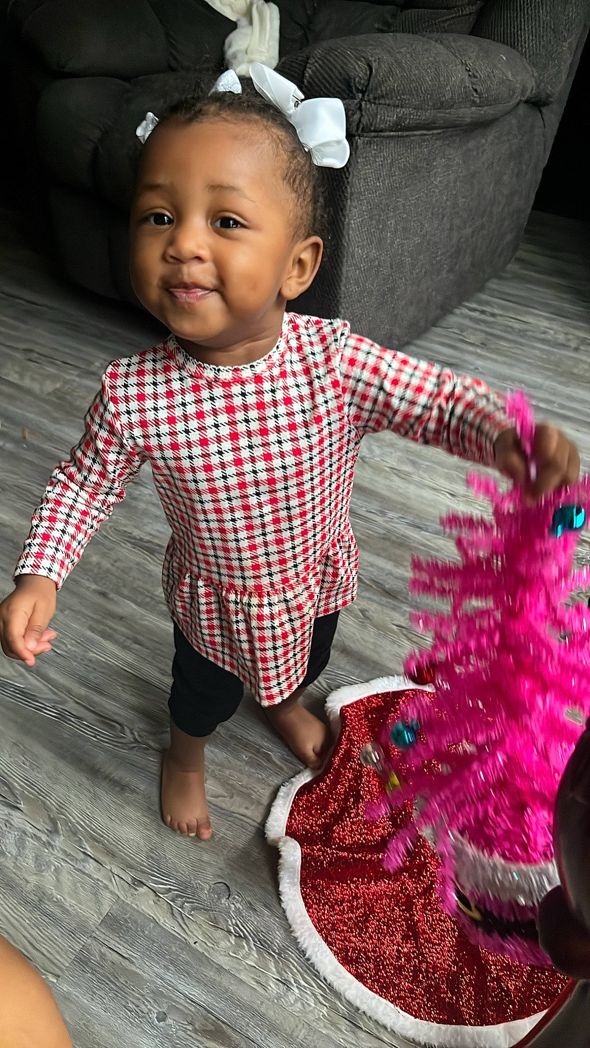 Za'Nylah joined the competition — help win amazing prizes! baby, baby_toddler_clothing, beauty, black, dress, face, flash_photography, happy, head, pattern, person, photograph, pink, plaid, skin, sleeve, smile, snapshot, tartan, textile