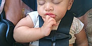 River joined the competition — help win amazing prizes! baby, sleeping, car_seat, child, infant, safety_strap, closed_eyes, hand, fingers, cute, peaceful, resting, young_child, seatbelt, clothing, portrait, indoors, soft_light, closeup, person