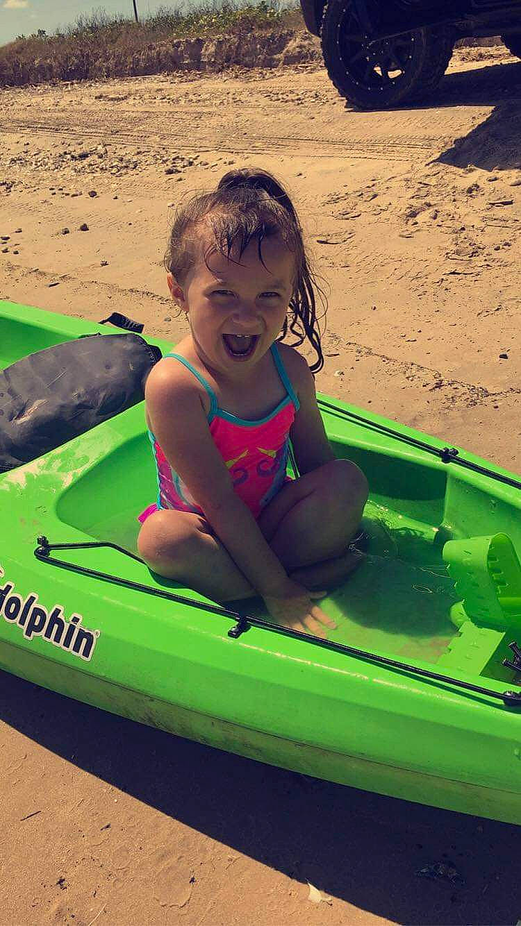 Adelin is registered to the contest to win money with this photo: boating, boats_and_boating_equipment_and_supplies, child, fun, games, green, inflatable, leisure, person, play, recreation, summer, vacation, vehicle