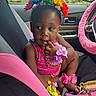 toddler, child, car_seat, flower_headband, pink, colorful, bracelets, car_interior, steering_wheel, keys, thoughtful, cute, baby, seat_cover, accessories, hand, foot, summer_clothing, window, nature_background