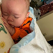 Weston is registered to the contest to win money with this photo: baby, bedroom, blanket, child, clothing, comfort, cozy, cute, face, head, home, indoor, infant, nap, peaceful, pillow, resting, sleeping, soft, toddler