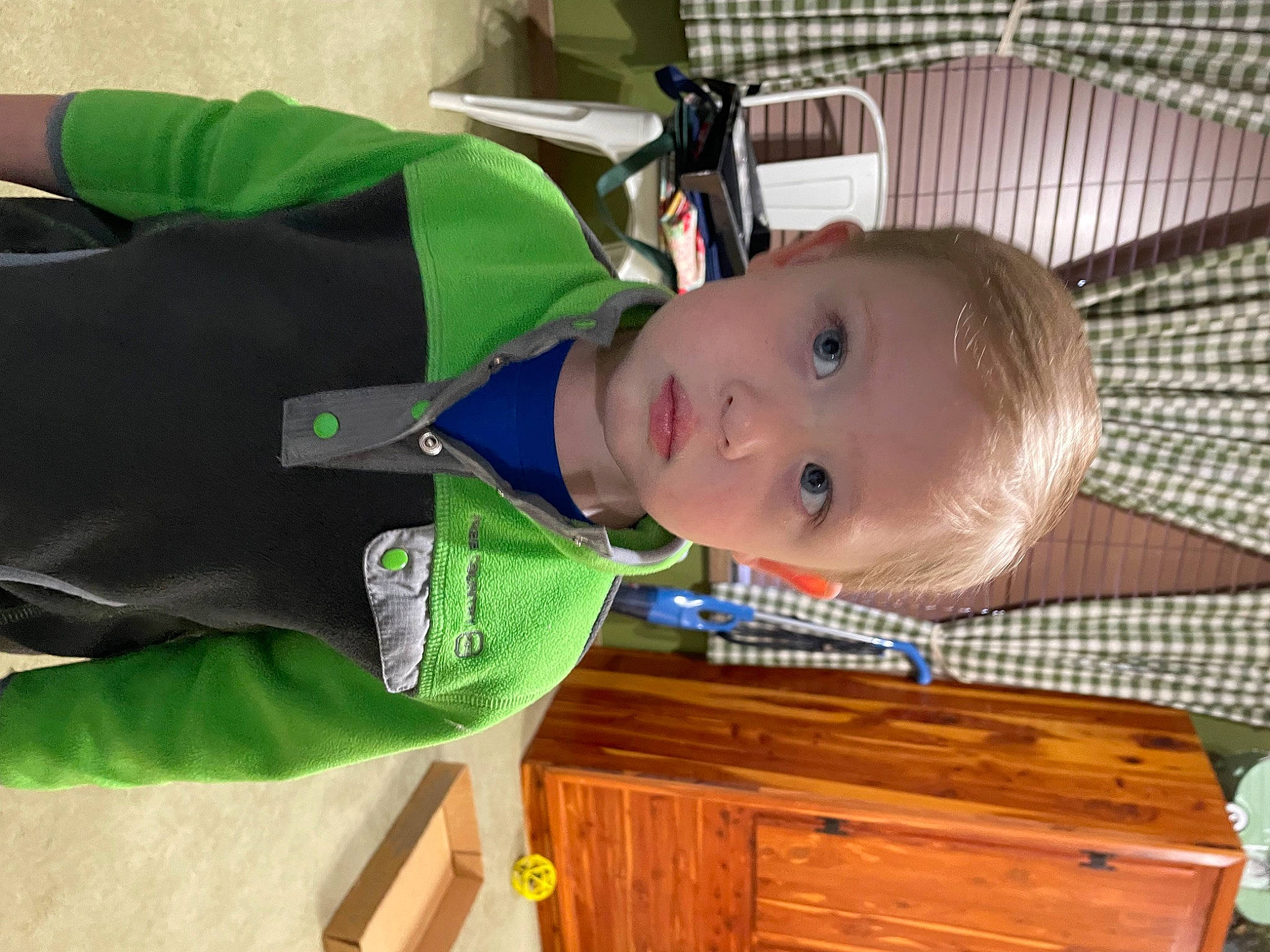 Keaton is registered to the contest to win money with this photo: baby, baby_products, baby_toddler_clothing, child, drawer, hardwood, person, room, sleeve, toddler, varnish, windbreaker, wood, wood_stain