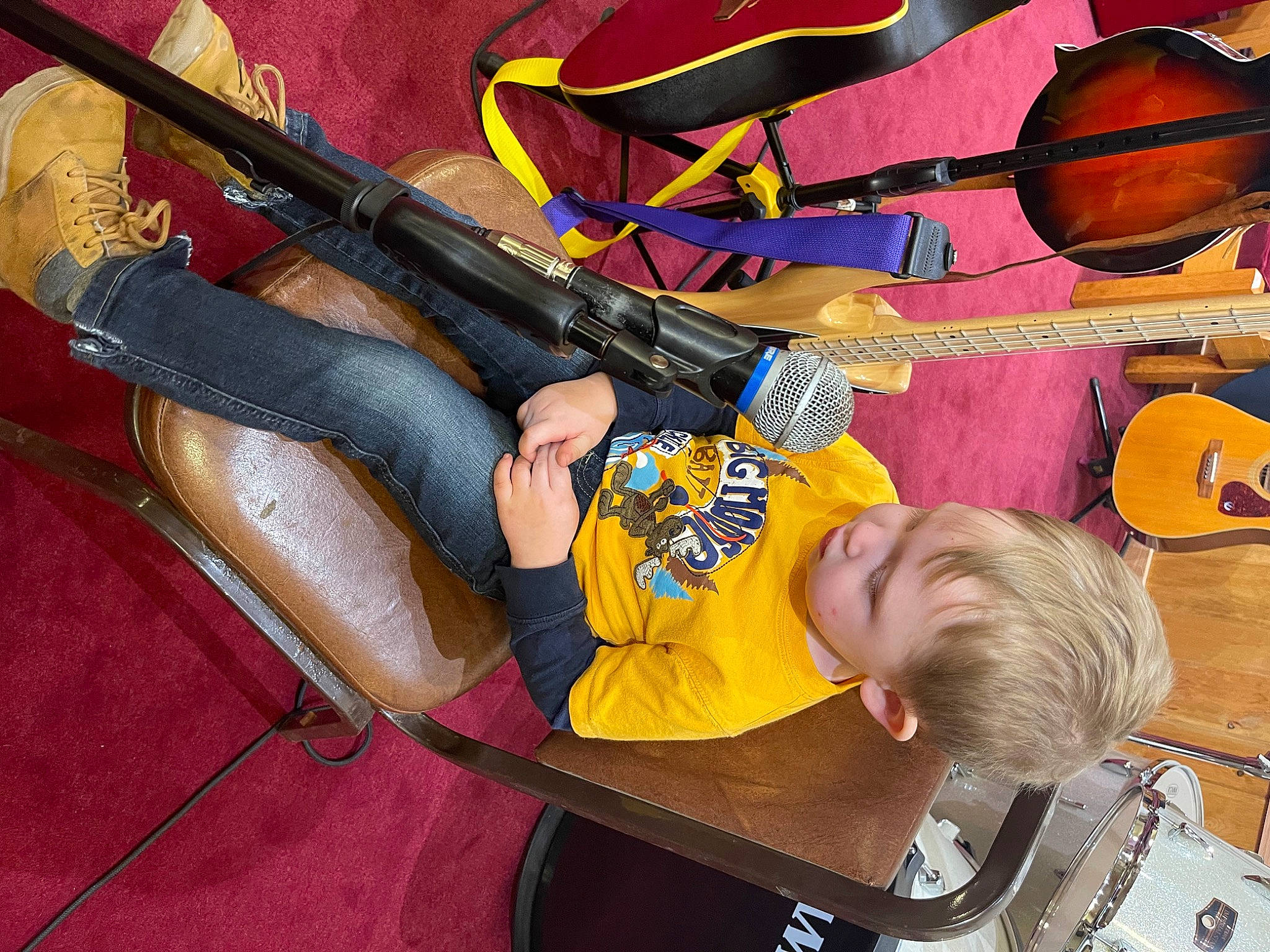Keaton joined the competition — help win amazing prizes! air_gun, baby, baby_toddler_clothing, child, comfort, folk_instrument, fun, human_leg, music, musical_instrument, orange, person, play, room, shooting, shotgun, string_instrument, t_shirt, thigh, toddler