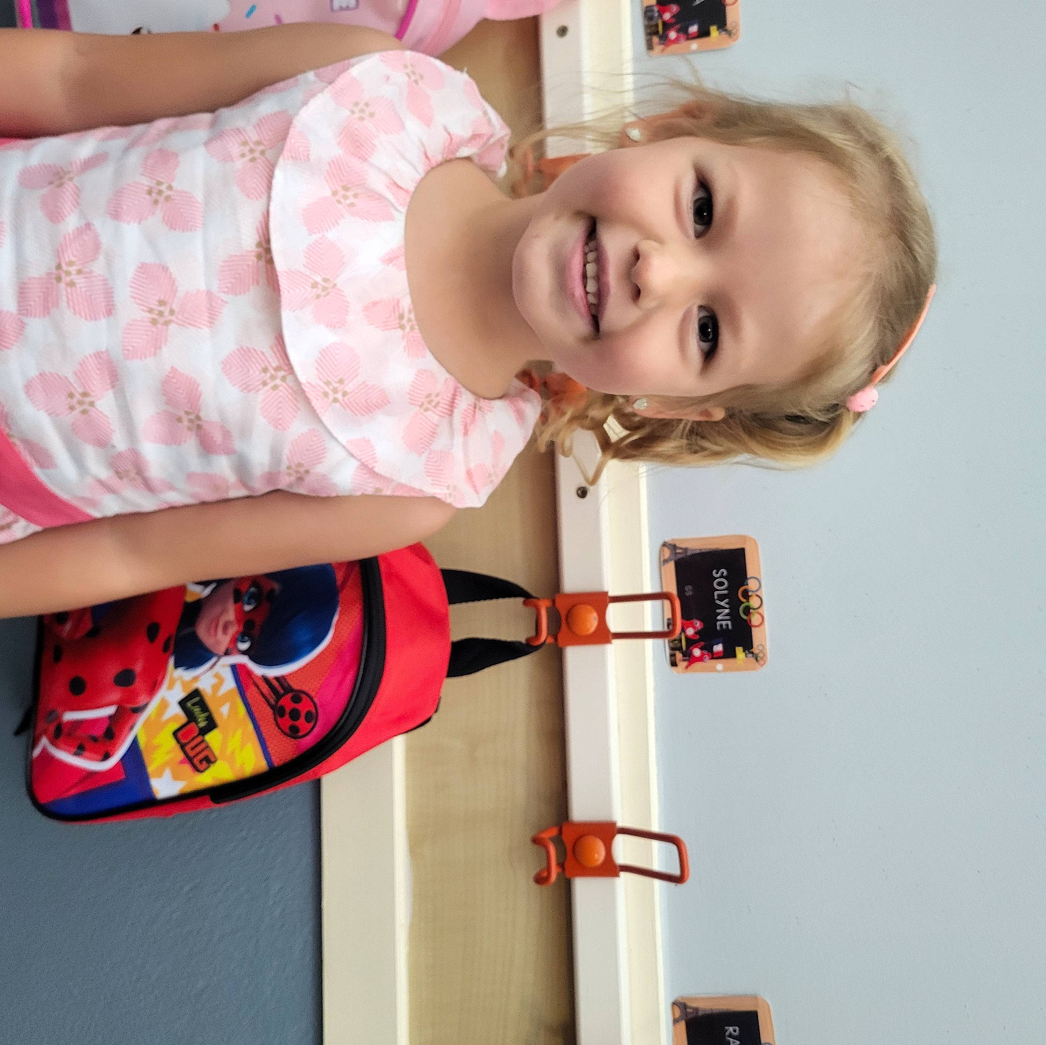 Sölyne participe au concours pour gagner de l'argent avec cette photo : baby, baby_products, baby_toddler_clothing, child, fun, happy, joy, pattern, person, red, room, smile, toddler, wheel, white