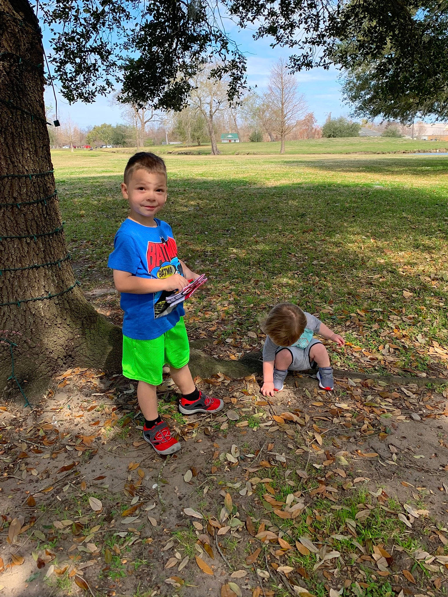 Baron joined the competition — help win amazing prizes! botany, child, footwear, grass, joy, landscape, leaf, leg, leisure, mammal, people_in_nature, person, plant, recreation, rural_area, shoe, shorts, sky, sneakers, toddler