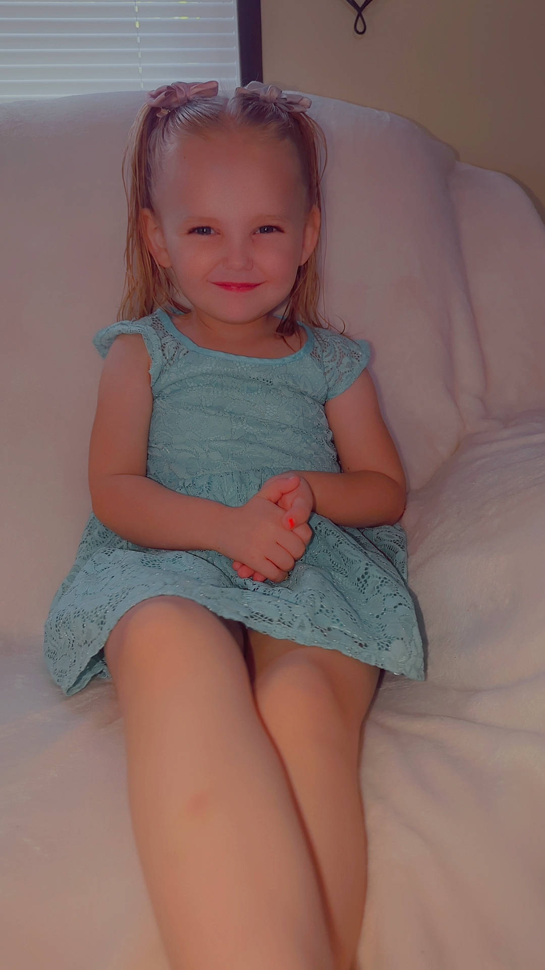 Isabelle is registered to the contest to win money with this photo: arm, baby_toddler_clothing, cheek, dress, eye, face, facial_expression, hair, hairstyle, head, human_body, iris, joint, joy, leg, organ, person, shoulder, skin, sleeve