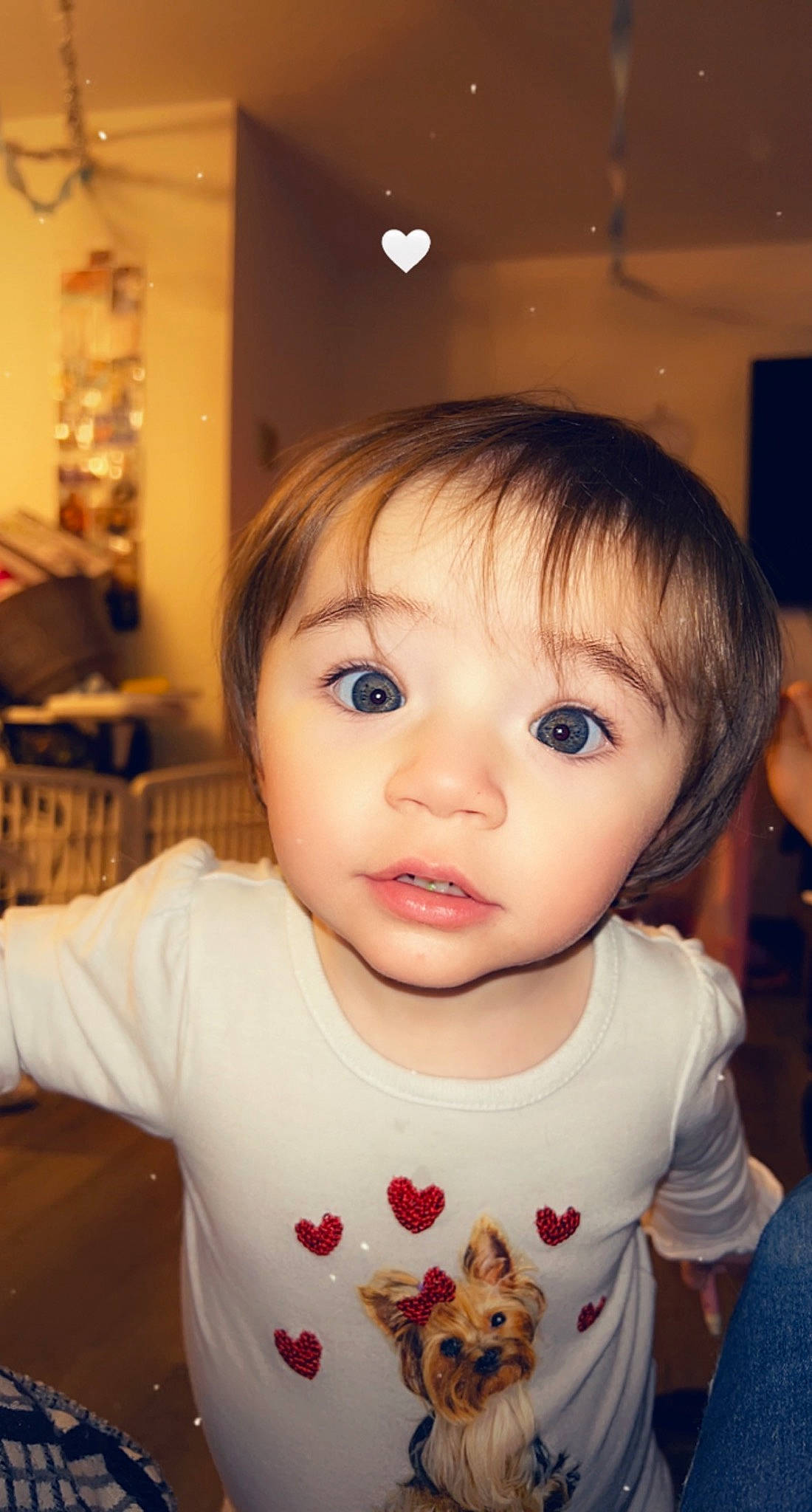 Jenna is registered to the contest to win money with this photo: baby, baby_toddler_clothing, bangs, cheek, chin, eyebrow, eyelash, forehead, fun, happy, iris, lip, mouth, neck, nose, person, skin, sleeve, smile, toddler