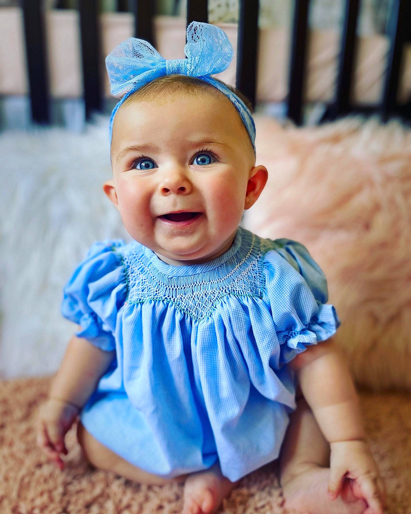 Althea joined the competition — help win amazing prizes! baby, baby_products, baby_toddler_clothing, blue, child, child_model, clothing, design, dress, face, fashion_accessory, hair_accessory, head, headband, headgear, person, pink, product, smile, toddler
