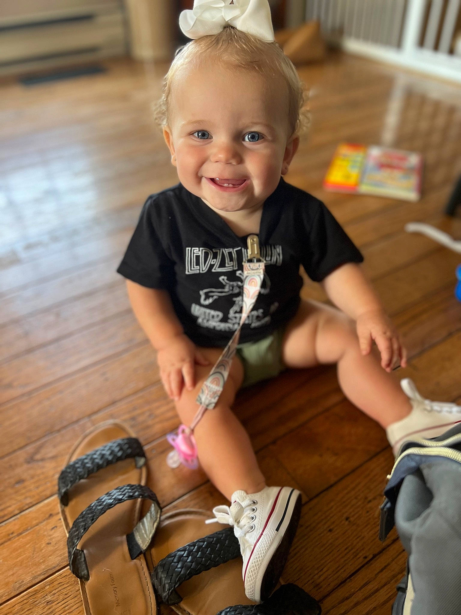 Kendall is registered to the contest to win money with this photo: baby_toddler_clothing, child, eye, floor, flooring, fun, happy, iris, joint, joy, knee, leg, person, product, shorts, skin, sleeve, smile, sock, thigh
