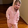 Aurora joined the competition — help win amazing prizes! child, toddler, hoodie, pink_clothing, slippers, indoor, wooden_floor, walking, cute, cozy, person, young_child, playful, casual_wear, flooring, home, apparel, feet, expression, curious