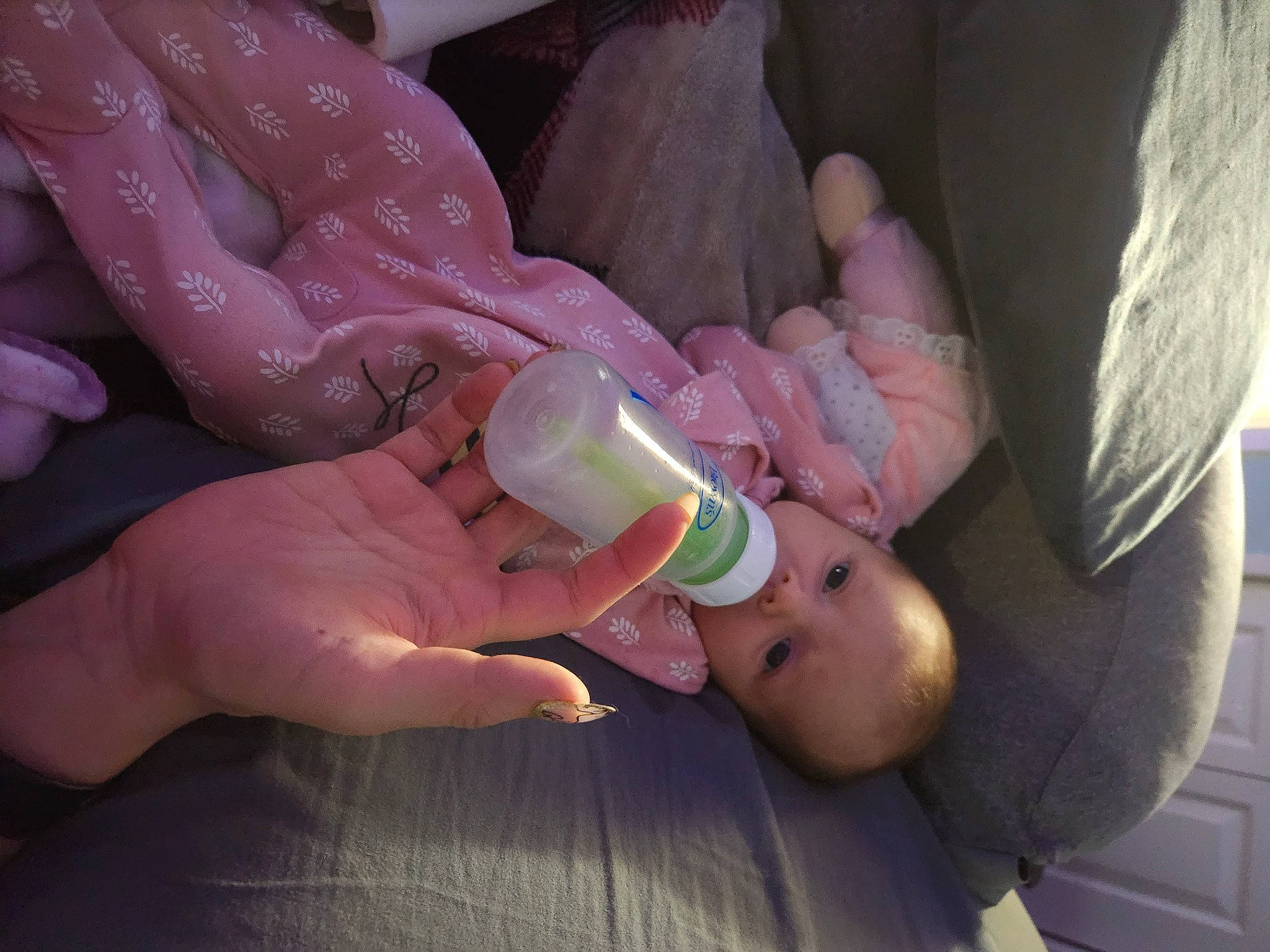 Izabella is registered to the contest to win money with this photo: baby, baby_bottle, baby_products, bottle, cheek, child, comfort, drinkware, eyelash, finger, gesture, hand, infant_formula, mouth, nail, person, plastic_bottle, skin, thumb, toddler