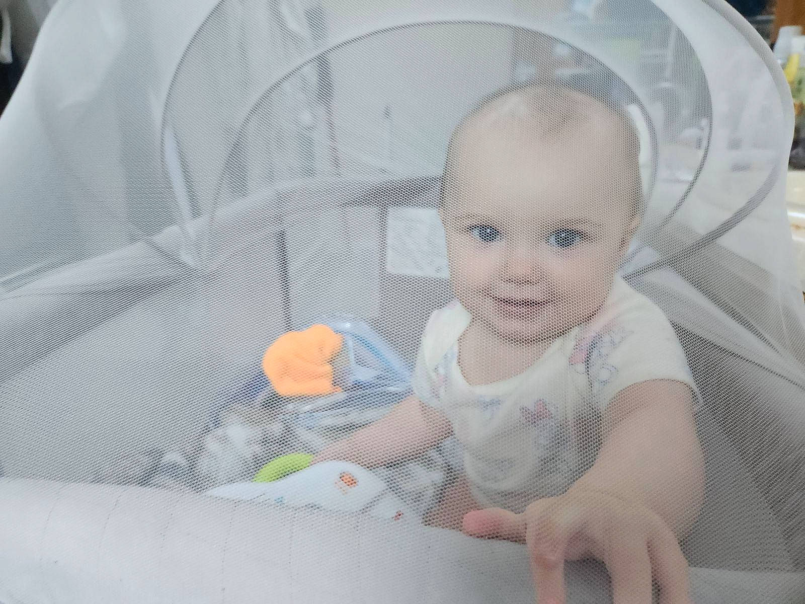 Izabella is registered to the contest to win money with this photo: art, baby, baby_carriage, baby_products, baby_safety, baby_toddler_clothing, cheek, child, circle, comfort, iris, linens, mouth, pattern, person, product, room, sitting, skin, smile