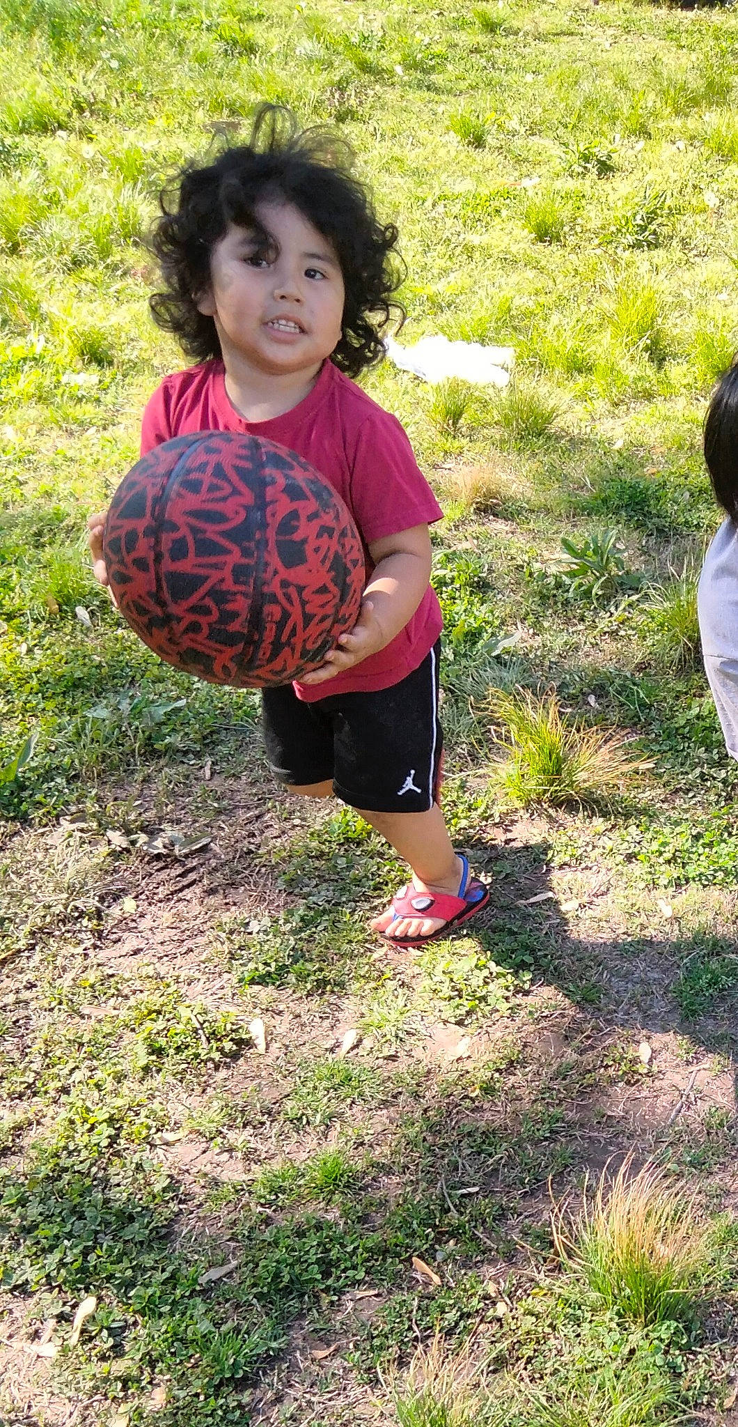 Bentley joined the competition — help win amazing prizes! ball, child, fun, grass, happy, human_leg, knee, leisure, people_in_nature, person, plant, play, playing_sports, recreation, sandal, shorts, sports_equipment, sports_toy, standing, thigh