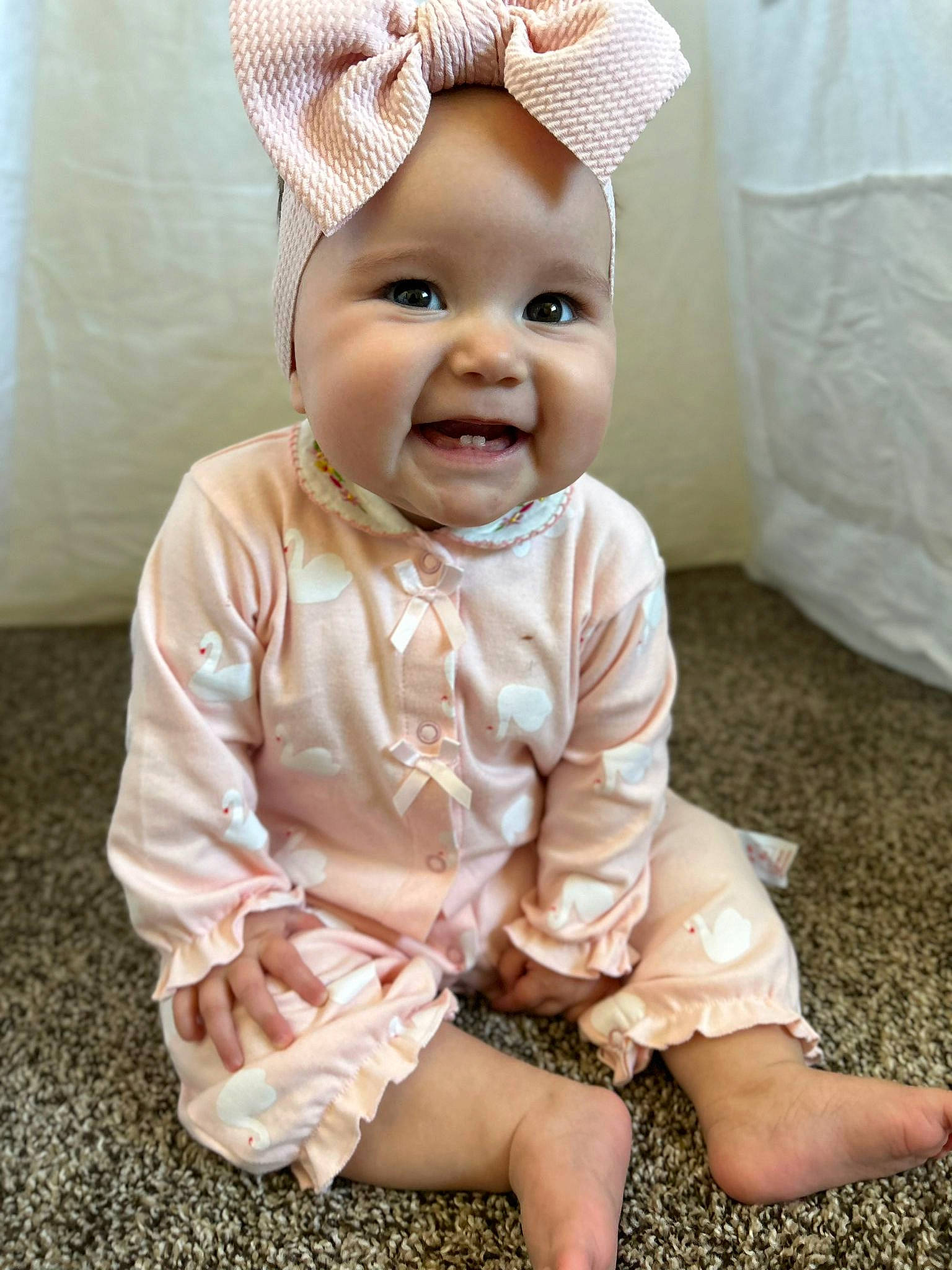 Alaïa joined the competition — help win amazing prizes! baby, baby_toddler_clothing, cap, child, costume_hat, dress, eye, face, fashion_accessory, grass, happy, head, headband, headwear, joy, peach, person, pink, sitting, skin