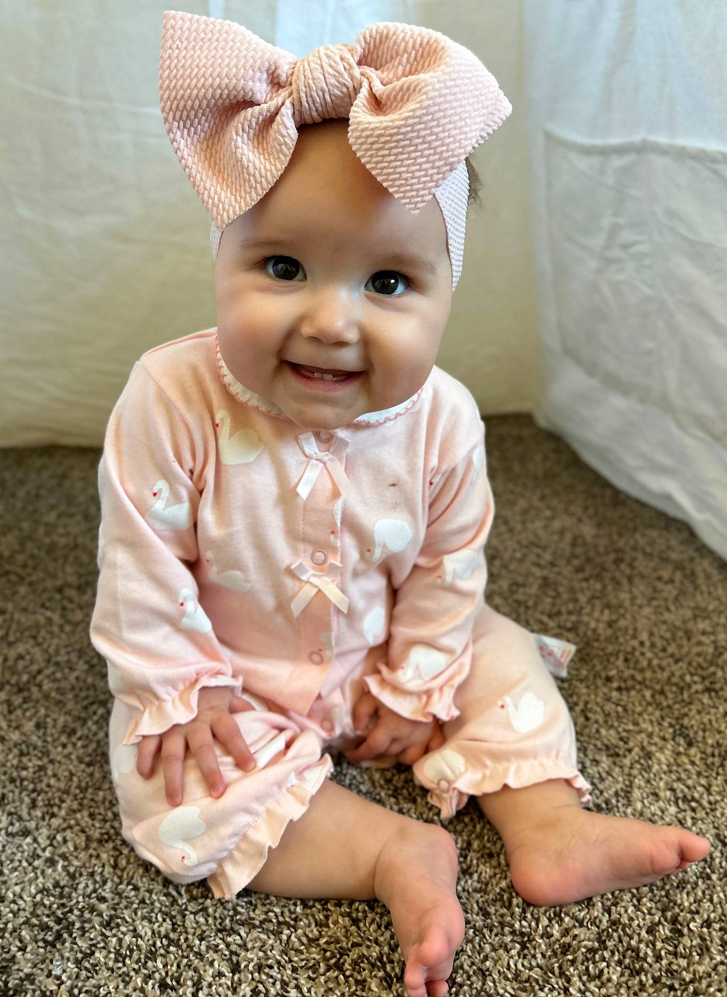 Alaïa is registered to the contest to win money with this photo: baby, baby_toddler_clothing, cap, costume_hat, dress, eye, fun, grass, happy, head, headband, headpiece, headwear, joy, magenta, person, pink, skin, sleeve, smile