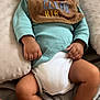 Jakai Kyrie joined the competition — help win amazing prizes! baby, smiling, infant, onesie, bib, blanket, lying_down, happy, relaxed, indoors, skin, foot, hand, head, face, clothing, comfort, soft, child, cute