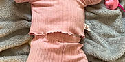 Jakiya Lyn is registered to the contest to win money with this photo: baby, infant, pink_clothing, headband, white_bow, blanket, pacifier, lying_down, soft_texture, cozy, cute, child, sleepwear, indoors, relaxed, small_hands, small_feet, portrait, baby_girl, comfortable