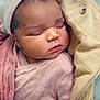 baby, sleeping, infant, hat, blanket, pink, striped_clothing, cozy, cute, face, peaceful, closeup, newborn, soft, child, portrait, apparel, resting, indoor, wrapped