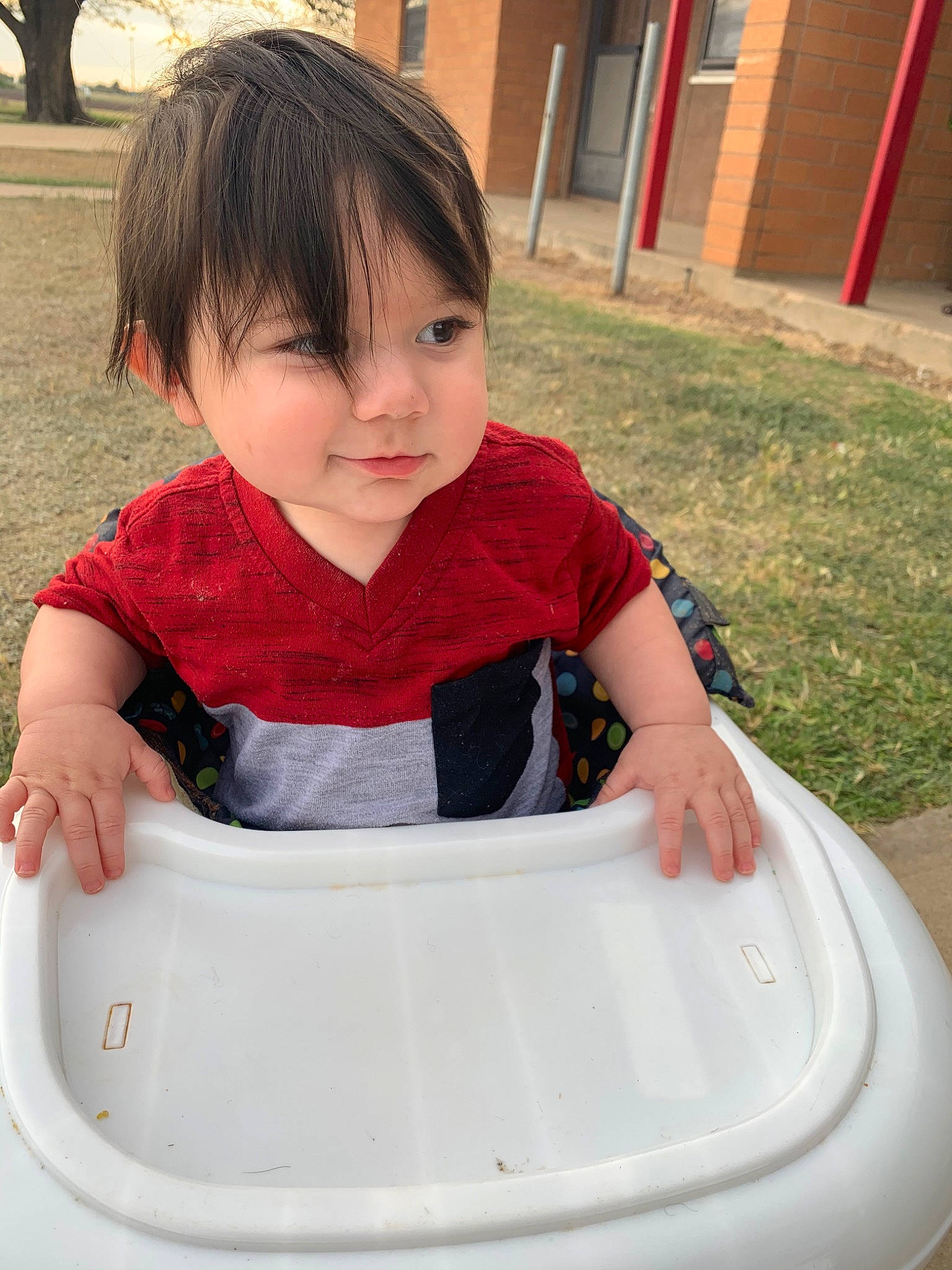 Leander joined the competition — help win amazing prizes! baby, baby_products, cheek, child, grass, leisure, outdoor_play_equipment, person, play, playground, product, recreation, sitting, skin, smile, summer, toddler, vacation