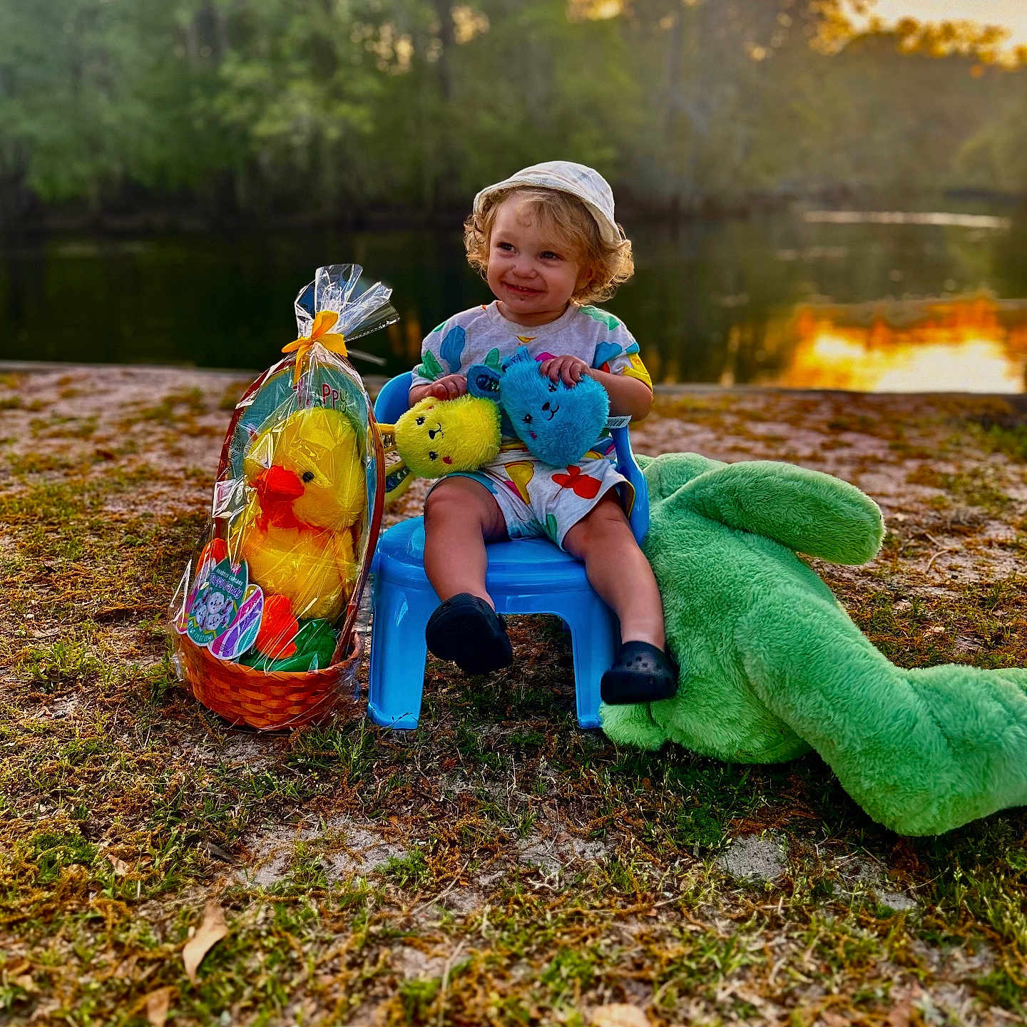 Mason joined the competition — help win amazing prizes! baby, ball, clothing, costume, face, football, grass, head, nature, outdoors, park, person, photography, plant, portrait, sitting, soccer, soccerball, summer, vegetation