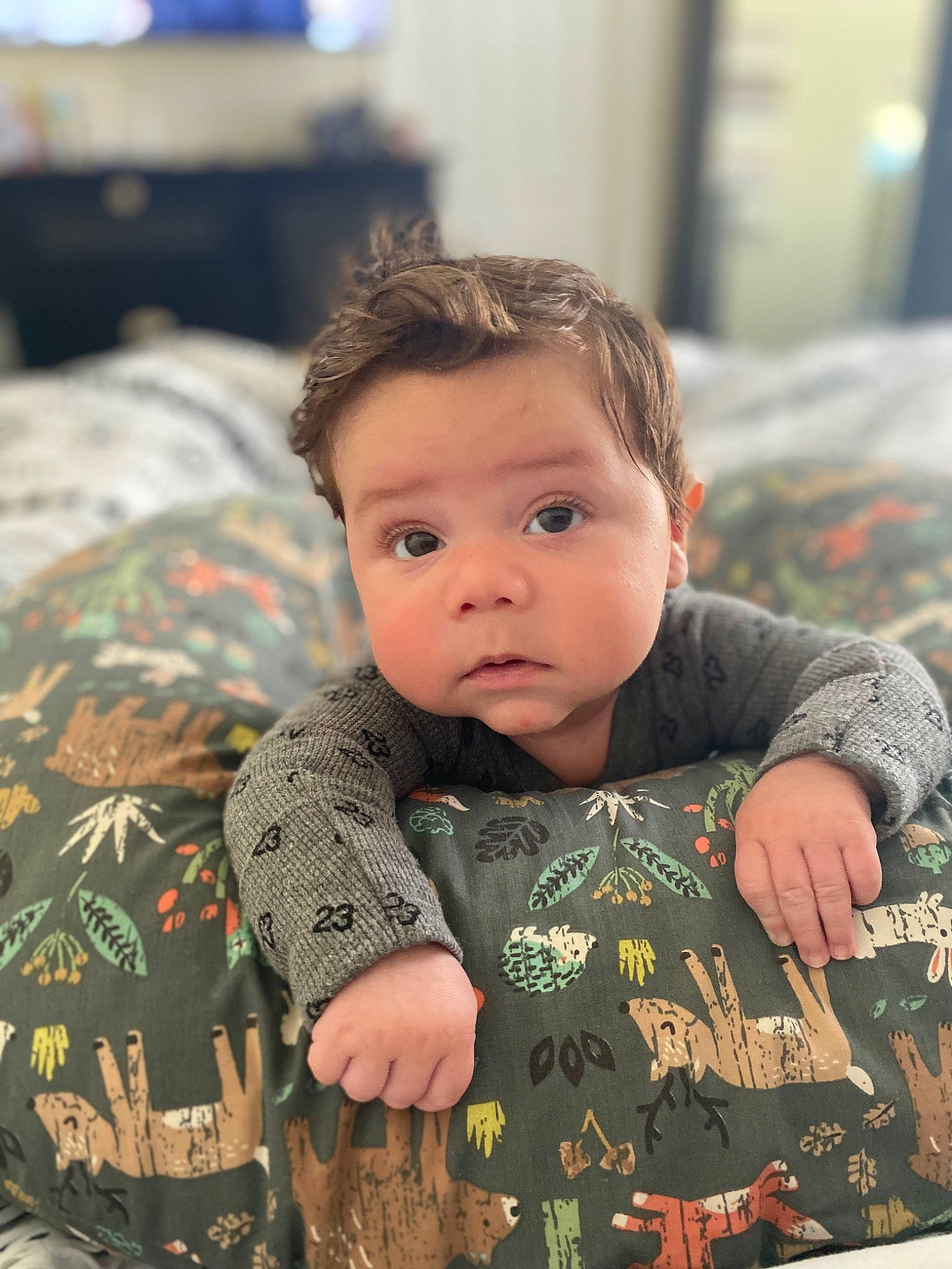 Ryland joined the competition — help win amazing prizes! baby, baby_toddler_clothing, cheek, child, comfort, eye, fun, hair, happy, head, human, iris, outerwear, person, sitting, skin, sleeve, surprise, t_shirt, textile