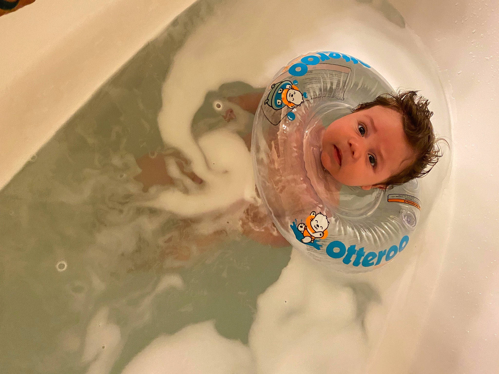 Ryland joined the competition — help win amazing prizes! baby, bathing, cap, chest, eyelash, fashion_accessory, fun, happy, hat, headgear, headpiece, leisure, mammal, person, personal_protective_equipment, recreation, skin, swimming_pool, toddler, vertebrate