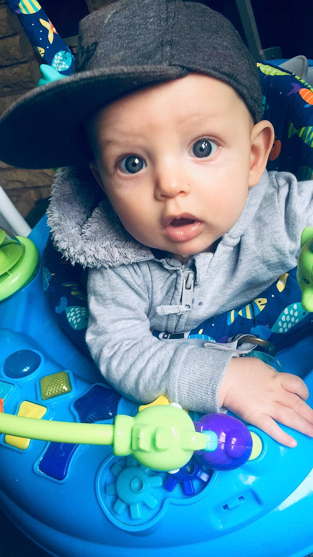 Filip is registered to the contest to win money with this photo: baby, baby_products, cheek, child, headwear, nose, person, play, product, skin, smile, surprise, toddler, toy