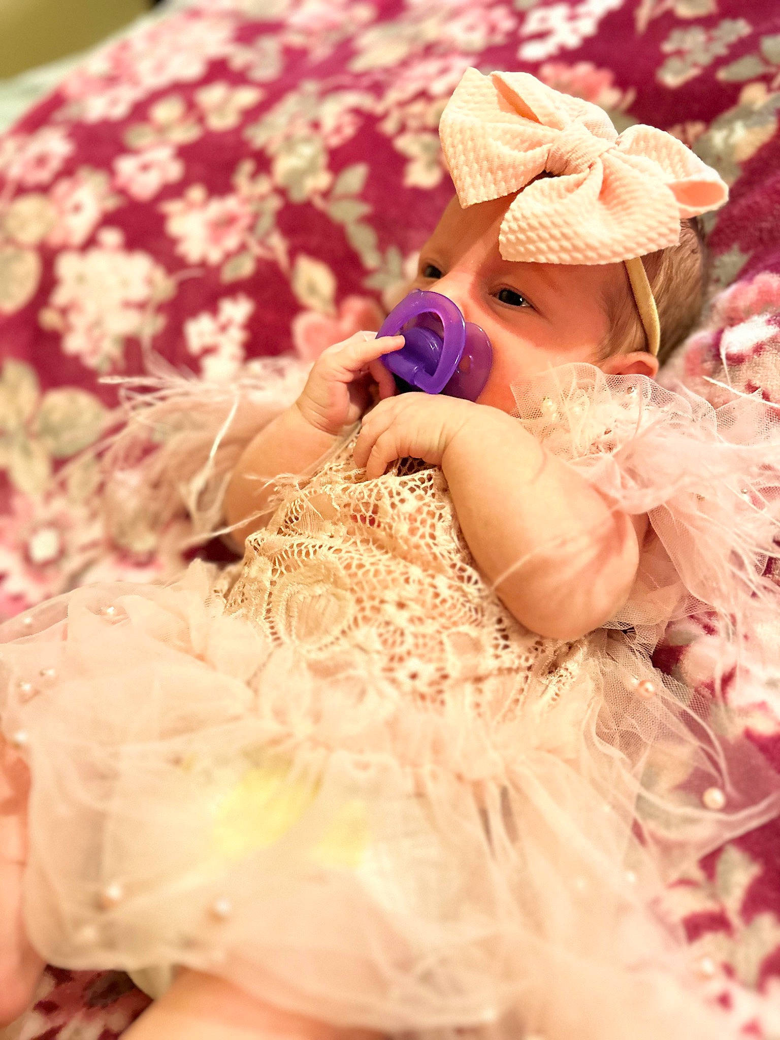 Octavia is registered to the contest to win money with this photo: baby_toddler_clothing, costume, embellishment, event, fashion_accessory, fashion_design, fur, grass, hair_accessory, happy, hat, headpiece, jewellery, magenta, pattern, peach, person, pink, ruffle, sun_hat