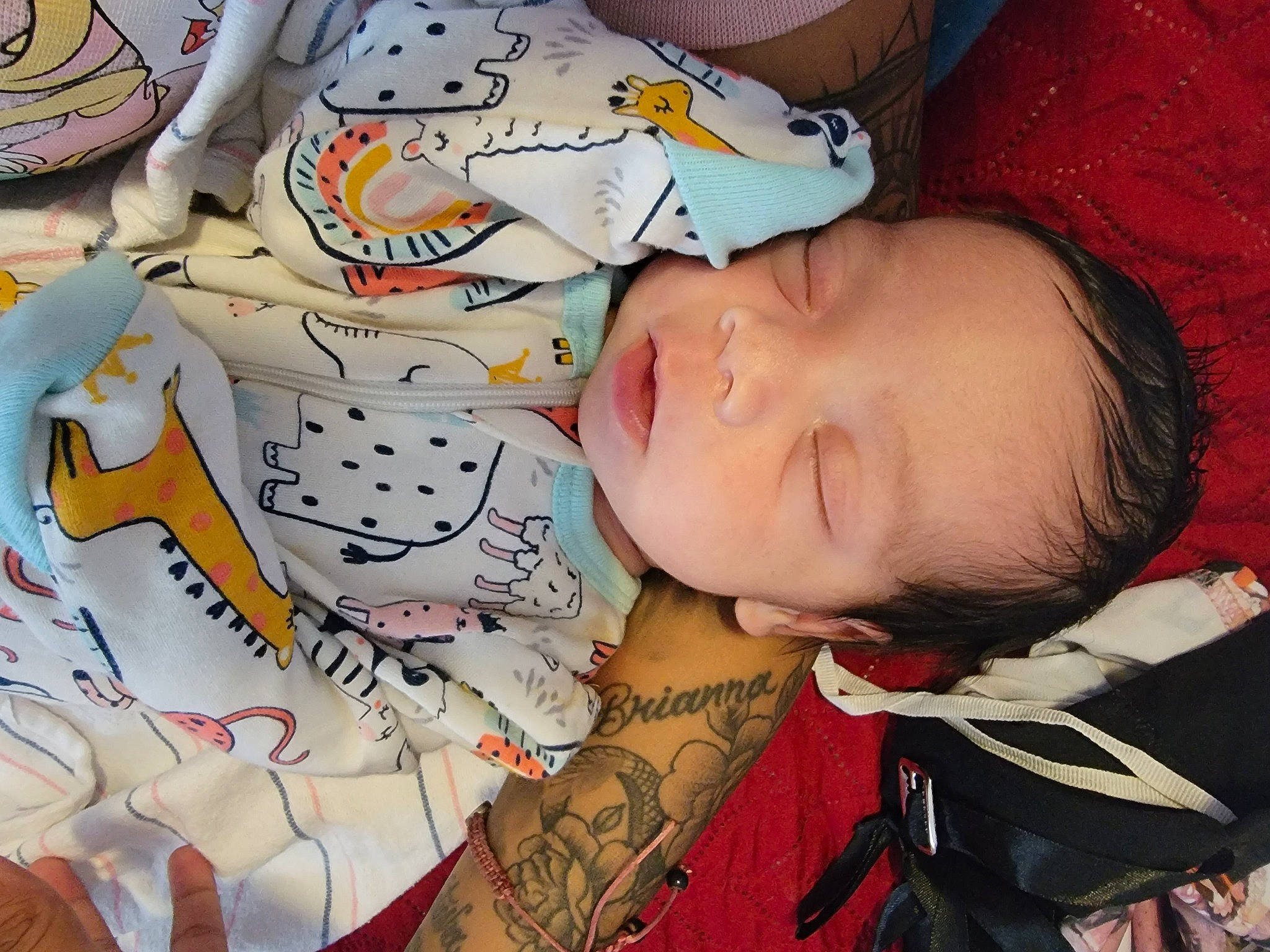 Scarlett is registered to the contest to win money with this photo: art, baby_products, black_hair, cheek, chest, child, cool, eyelash, finger, flesh, fun, happy, mouth, neck, pattern, person, sleeve, tattoo_artist, temporary_tattoo, toddler