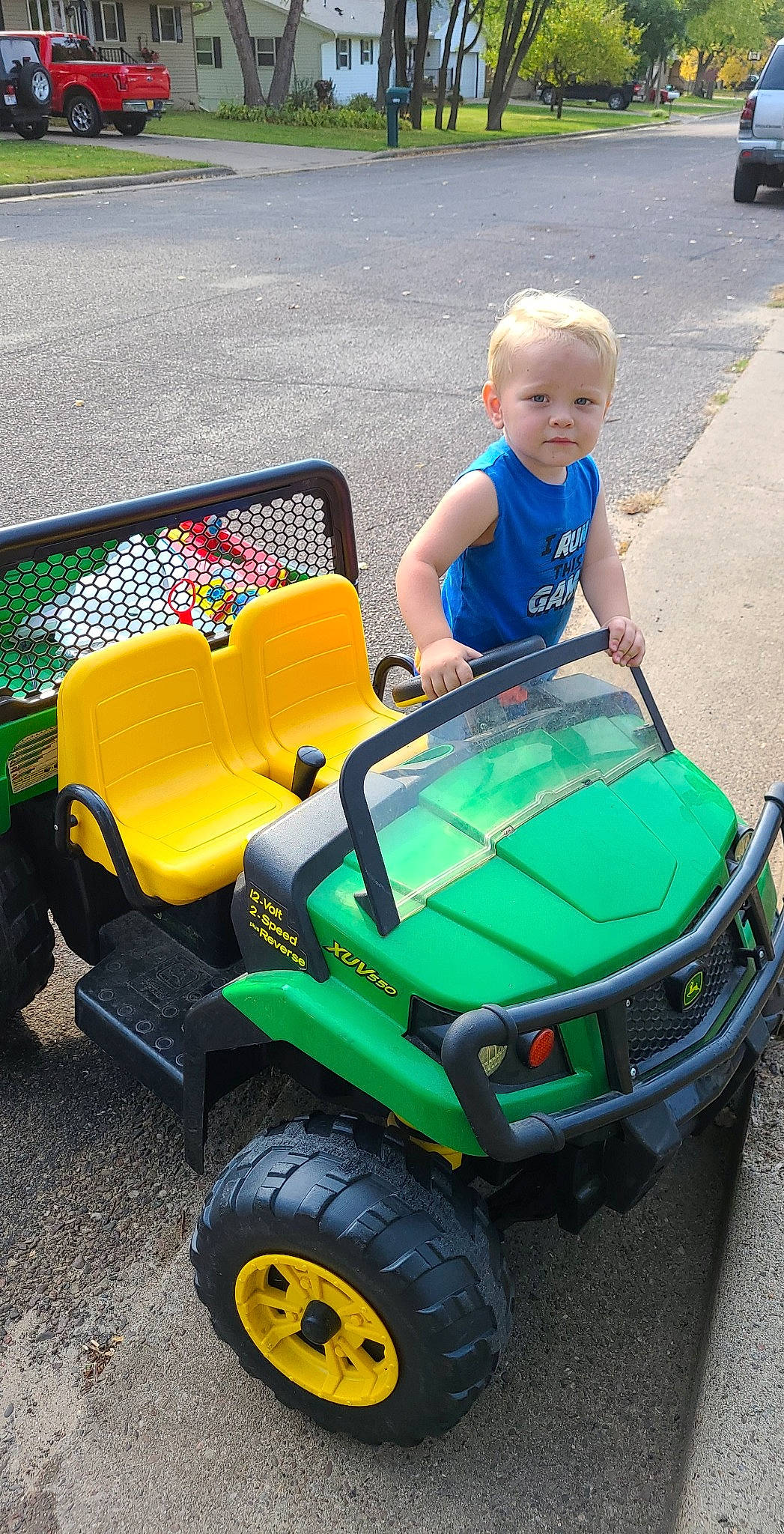 Kalvin joined the competition — help win amazing prizes! all_terrain_vehicle, car, child, fun, land_vehicle, lawn, outdoor_power_equipment, person, play, riding_mower, riding_toy, toddler, vacation, vehicle