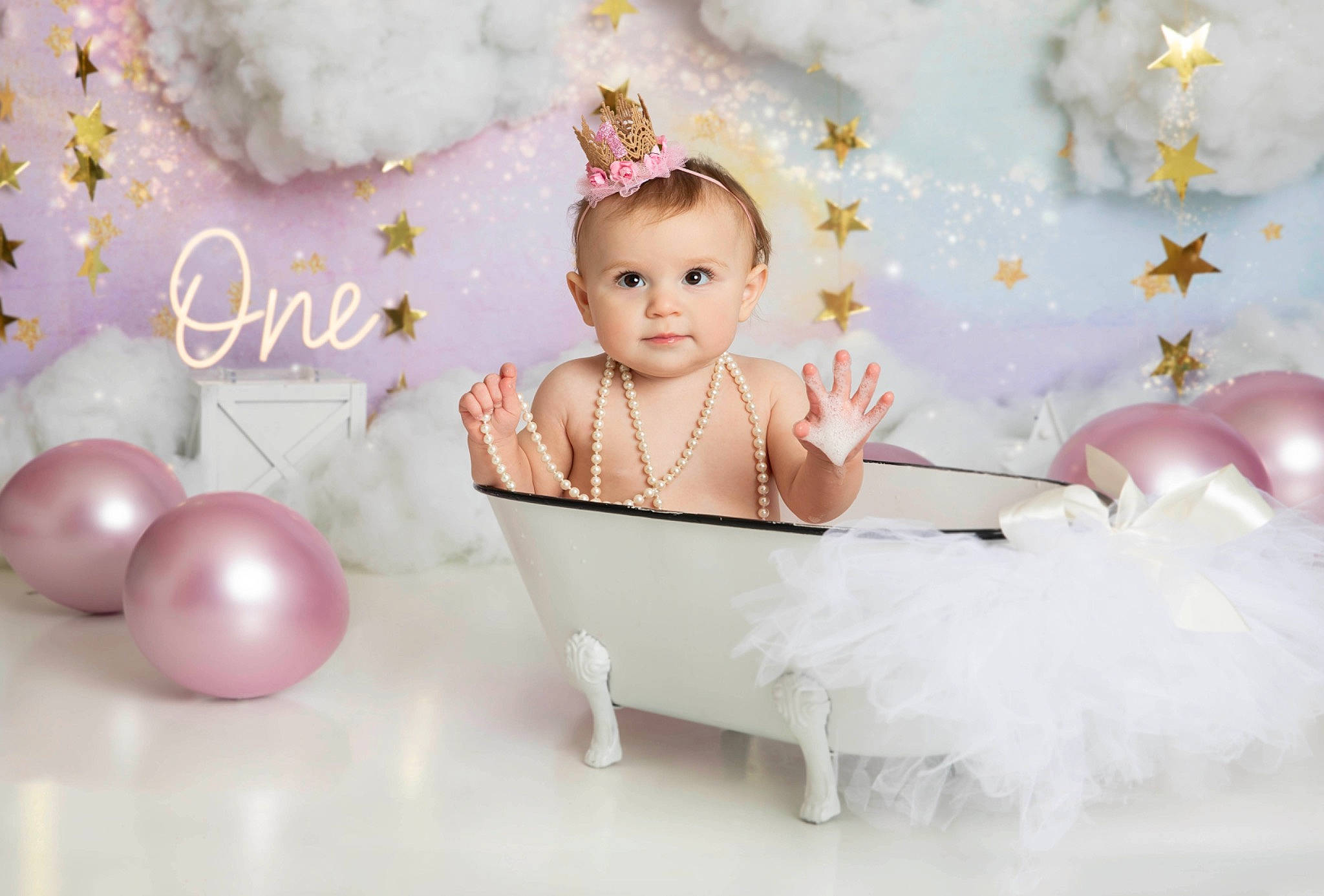 Leila is registered to the contest to win money with this photo: baby, baby_products, baby_toddler_clothing, balloon, child, event, facial_expression, fashion_accessory, flash_photography, happy, headband, headpiece, party_supply, person, petal, picture_frame, pink, product, smile, sweetness