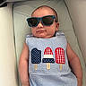 Lucas joined the competition — help win amazing prizes! baby, child, sunglasses, blue, striped_outfit, popsicle_patch, cushion, comfortable, indoor, summer, cute, fashion, relaxed, infant, portrait, smile, seat, clothing, accessory, person