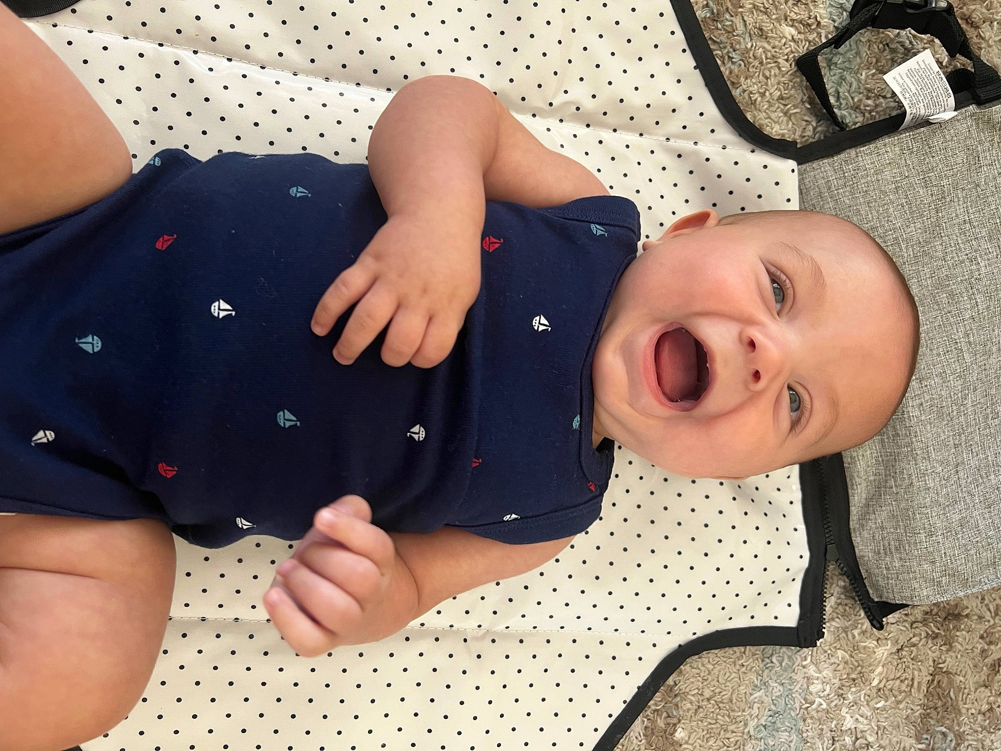 Hayden is registered to the contest to win money with this photo: baby, baby_toddler_clothing, cheek, chest, comfort, elbow, finger, gesture, happy, joint, mouth, neck, person, skin, sleeve, smile, thigh, thumb, toddler, wood