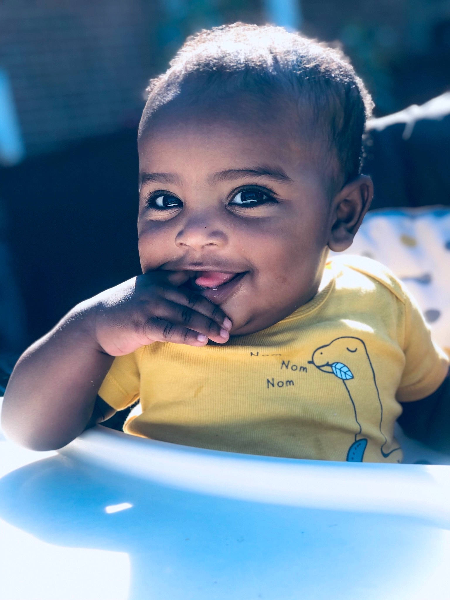 Alijah is registered to the contest to win money with this photo: baby, cheek, child, eye, face, forehead, fun, games, happy, head, leisure, person, recreation, skin, smile, toddler, vacation