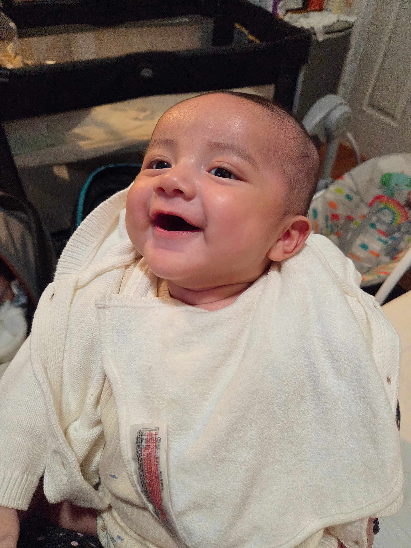 Iliam Morikone joined the competition — help win amazing prizes! baby, smile, infant, white_blanket, cozy, happy, child, indoors, face, clothing, home, person, cute, newborn, baby_gear, blanket, sitting, portrait, warm, joyful