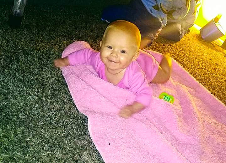 Aubrianna is registered to the contest to win money with this photo: baby, child, fun, grass, joy, person, pink, plant, play, purple, skin, smile, toddler