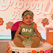 Unity joined the competition — help win amazing prizes! baby, balloons, birthday, celebration, child, colorful, daisy, decorations, festive, first_birthday, green_outfit, happy, headband, high_chair, indoor, one, party, person, smiling, toddler