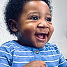 Jiquavious is registered to the contest to win money with this photo: baby, blue_shirt, child, closeup, curly_hair, cute, expression, face, hands, happy, holding, indoor, infant, joy, person, portrait, skin, smile, striped_clothing, young