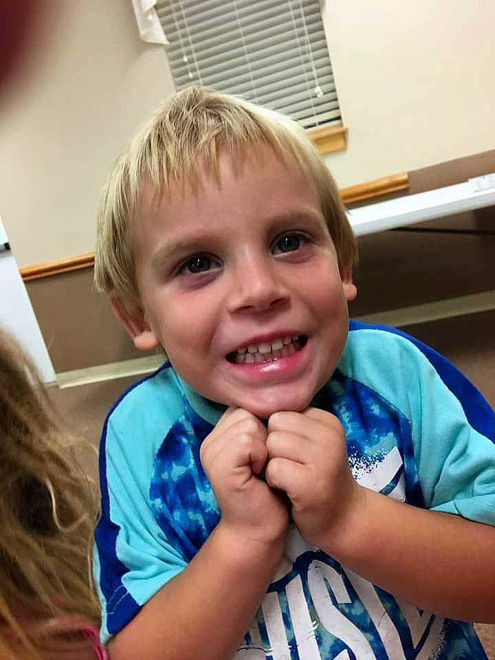 Christopher is registered to the contest to win money with this photo: baby_toddler_clothing, cheek, child, chin, electric_blue, eyebrow, eyelash, finger, fun, gesture, hand, happy, iris, joy, nose, person, sitting, sleeve, smile, t_shirt