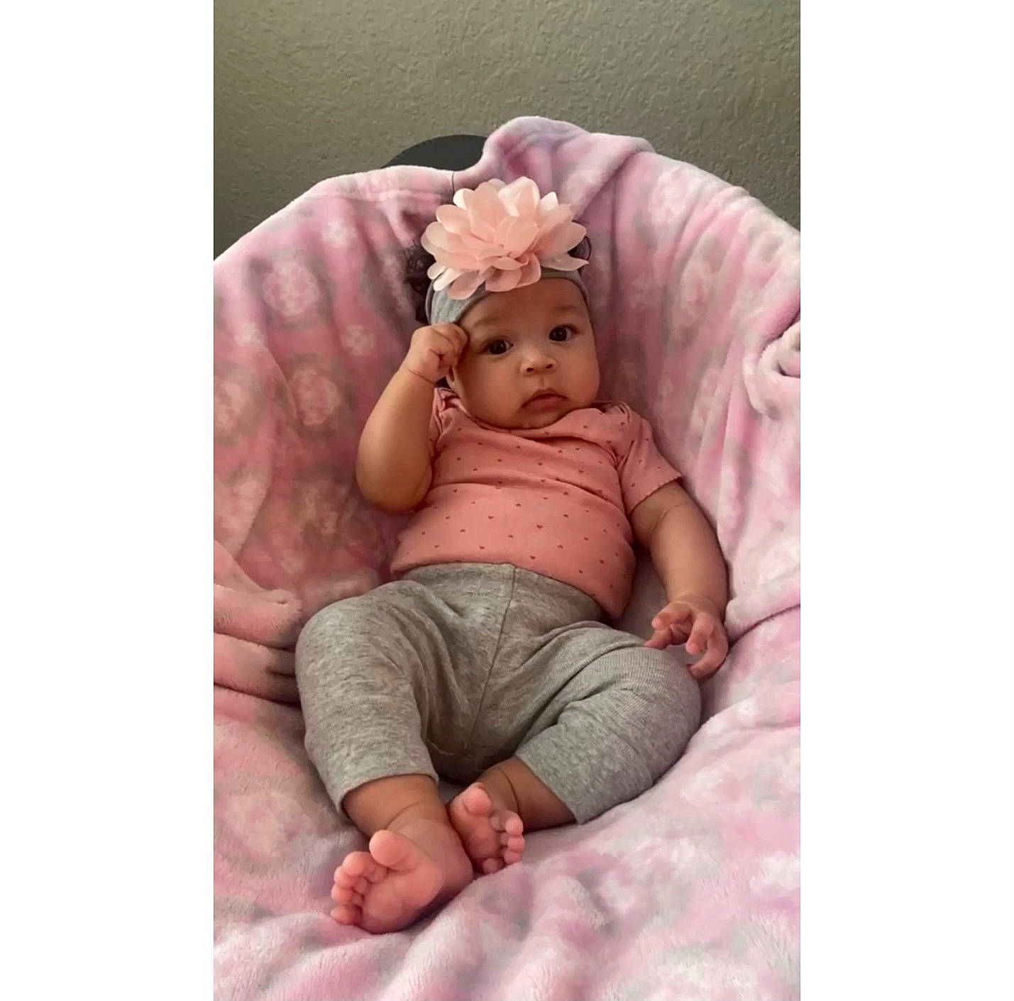 Amiyah Kehlani is registered to the contest to win money with this photo: arm, baby, baby_toddler_clothing, bed, comfort, eye, eyelash, hand, happy, head, headwear, human_body, leg, linens, magenta, person, pink, skin, sleeve, thumb