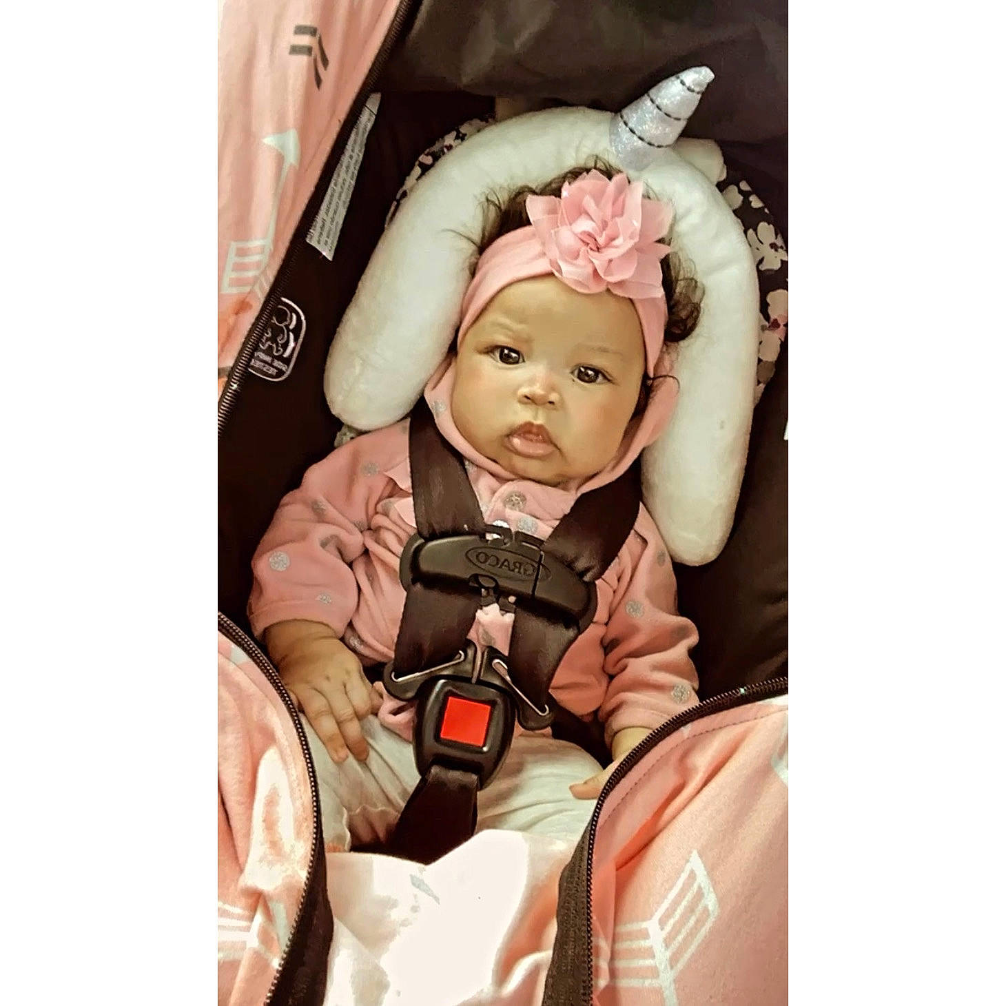 Amiyah Kehlani is registered to the contest to win money with this photo: auto_part, baby, baby_products, baby_toddler_clothing, bag, car_seat, child, comfort, fashion_accessory, font, gadget, happy, head, headwear, magenta, pattern, peach, person, personal_protective_equipment, sitting