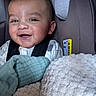 Aziel joined the competition — help win amazing prizes! baby, blanket, car_seat, child, closeup, clothing, comfort, cozy, cute, face, happy, indoors, infant, person, portrait, seatbelt, sleepy, smiling, warm, young_child