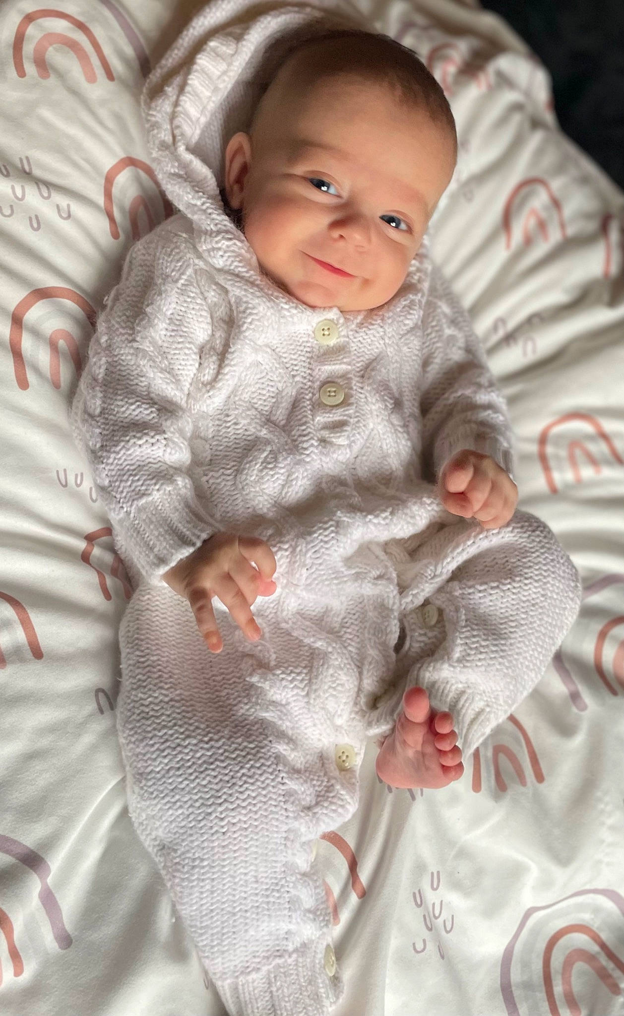 Lainey joined the competition — help win amazing prizes! baby, baby_toddler_clothing, bedding, cheek, child, comfort, fun, fur, gesture, happy, linens, pattern, person, portrait_photography, sitting, skin, sleeve, smile, toddler