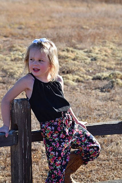 Caylee is registered to the contest to win money with this photo: beauty, blond, child, child_model, fun, happy, jeans, long_hair, pattern, people, person, photograph, photography, pink, sleeve, smile, summer, toddler, tree, vacation