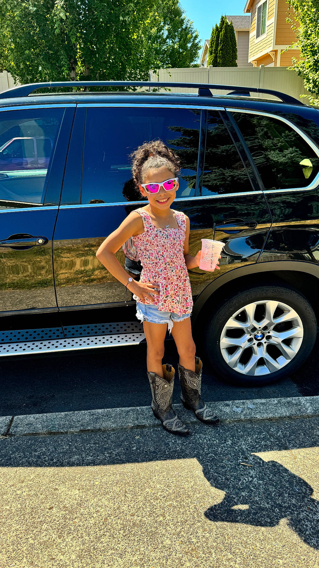 Layla is registered to the contest to win money with this photo: accessories, alloywheel, car, carwheel, child, clothing, female, footwear, girl, glasses, jewelry, machine, necklace, person, shoe, spoke, tire, transportation, vehicle, wheel