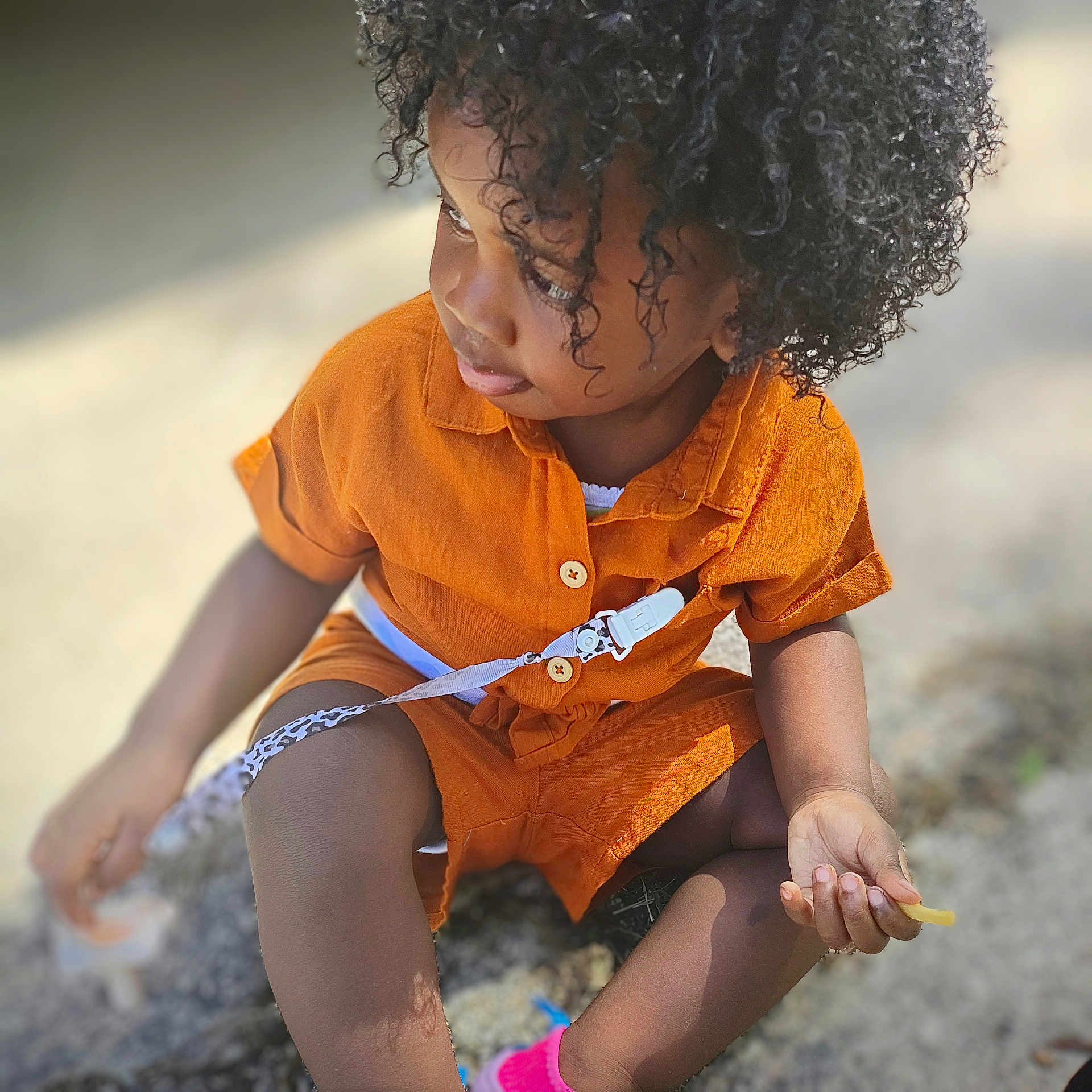 Emani joined the competition — help win amazing prizes! blackhair, bodypart, child, clothing, curlyhair, face, female, finger, girl, glove, hair, hand, head, person, photography, portrait, shorts, shoulder, sitting, sleeve