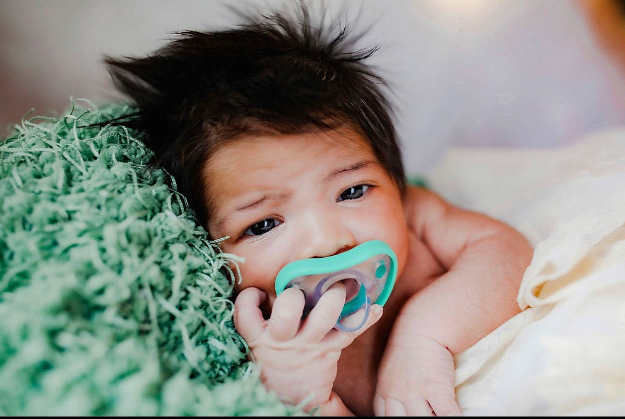 Armani joined the competition — help win amazing prizes! baby, child, comfort, eyelash, fashion_accessory, finger, flash_photography, fur, gesture, grass, happy, iris, jaw, linens, lip, nail, person, skin, sweetness, thumb