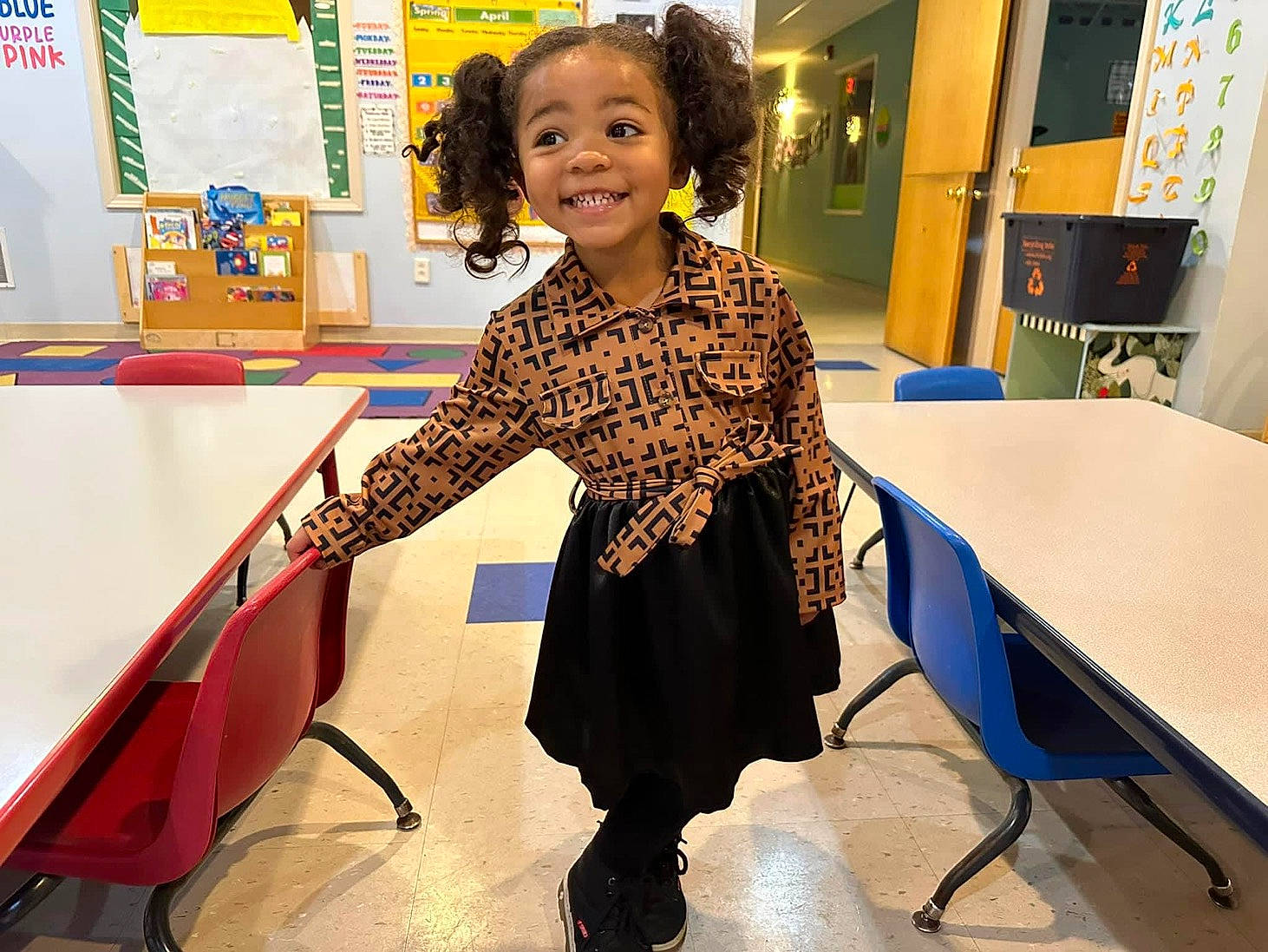 Armani joined the competition — help win amazing prizes! art, chair, child, desk, education, event, fashion_design, flooring, job, joy, learning, leisure, office_supplies, pattern, person, play, recreation, smile, standing, table